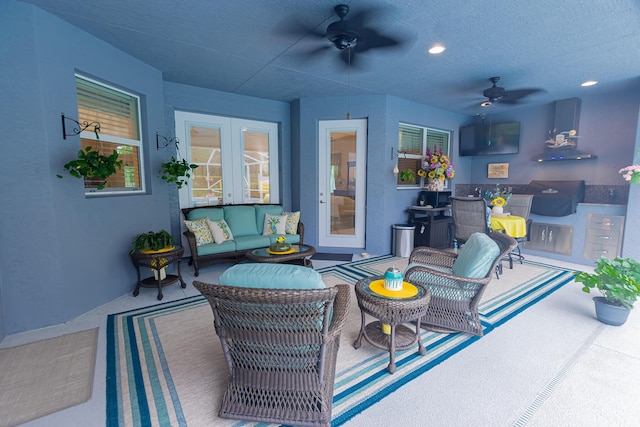 5927 NW Favian Ave, Port Saint Lucie, FL 34986 - view of patio with a ceiling fan and an outdoor living space