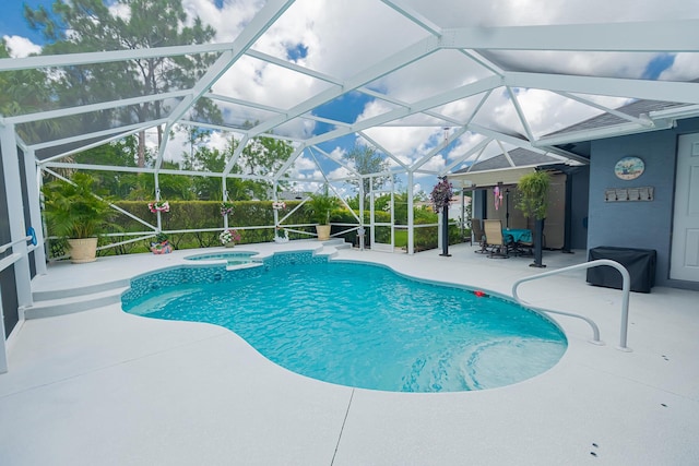 5927 NW Favian Ave, Port Saint Lucie, FL 34986 - view of pool with a patio area, a lanai, and a pool with connected hot tub