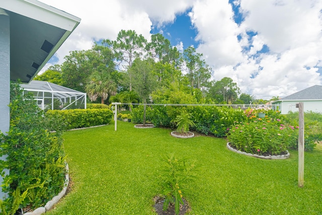 5927 NW Favian Ave, Port Saint Lucie, FL 34986 - view of green lawn featuring view of wooded area
