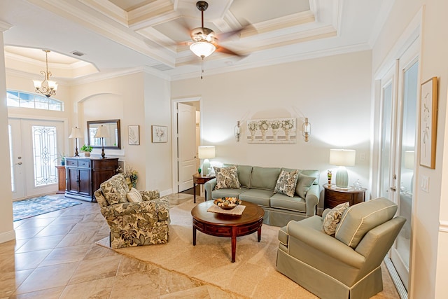 5927 NW Favian Ave, Port Saint Lucie, FL 34986 - living room with crown molding, a chandelier, ceiling fan, and a raised ceiling