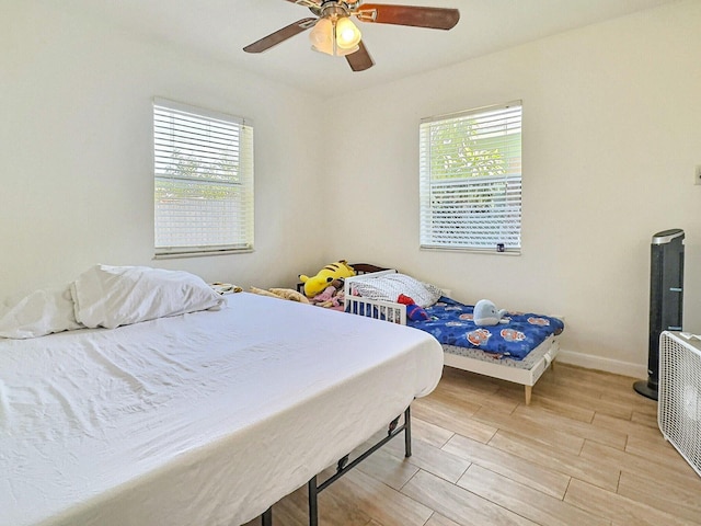 1206 Crestwood Blvd, Lake Worth, FL 33460 - bedroom with light wood-type flooring and ceiling fan