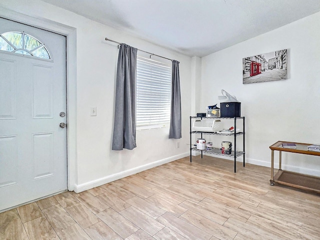 1206 Crestwood Blvd, Lake Worth, FL 33460 - entrance foyer featuring light wood-type flooring and baseboards