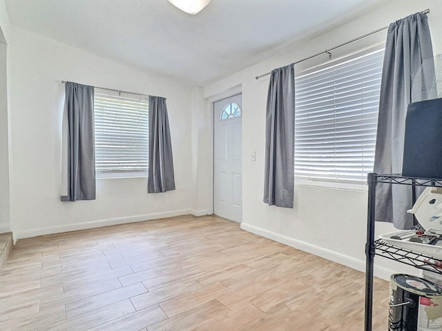 1206 Crestwood Blvd, Lake Worth, FL 33460 - entrance foyer with wood finished floors and vaulted ceiling