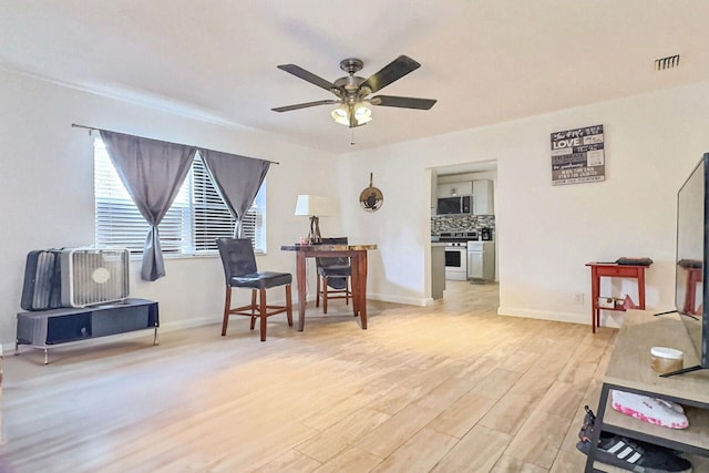 1206 Crestwood Blvd, Lake Worth, FL 33460 - office area featuring ceiling fan and light wood-type flooring