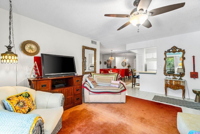 1124 NW 13th St Unit 204A, Boca Raton, FL 33486 - living room featuring a ceiling fan, light colored carpet, and a textured ceiling