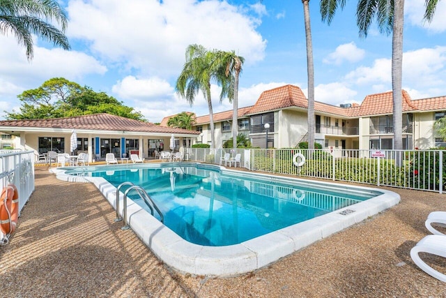 1124 NW 13th St Unit 204A, Boca Raton, FL 33486 - community pool featuring a patio