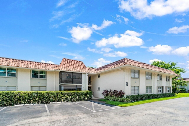 1124 NW 13th St Unit 204A, Boca Raton, FL 33486 - view of property with uncovered parking