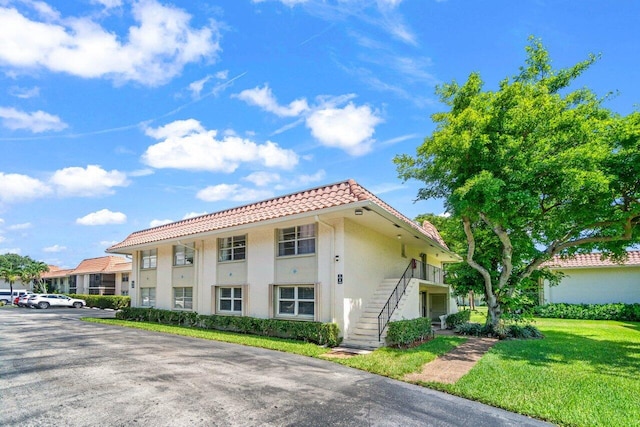 1124 NW 13th St Unit 204A, Boca Raton, FL 33486 - view of property with stairs