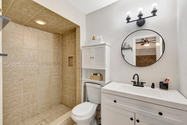 557 SW Violet Ave, Port Saint Lucie, FL 34983 - full bathroom with vanity, a ceiling fan, and a tile shower