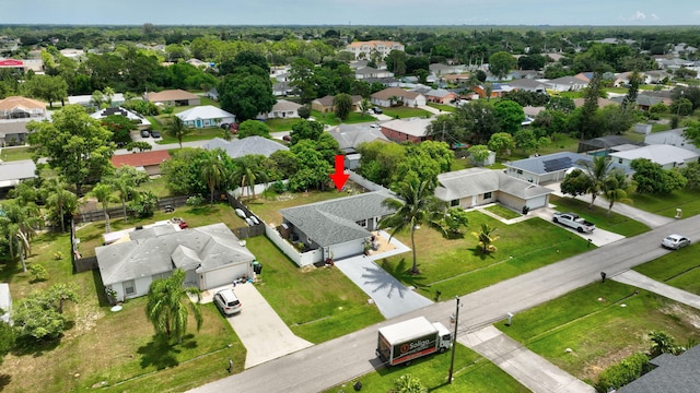 557 SW Violet Ave, Port Saint Lucie, FL 34983 - aerial perspective of suburban area
