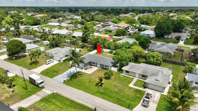 557 SW Violet Ave, Port Saint Lucie, FL 34983 - aerial perspective of suburban area