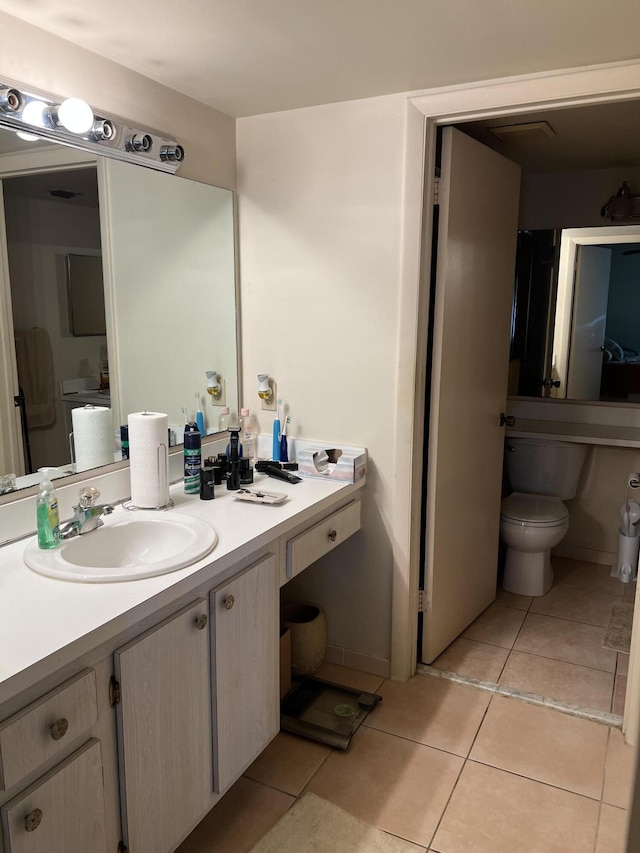 3623 La Playas Ct Unit A-1, Greenacres, FL 33463 - bathroom with tile patterned flooring and vanity
