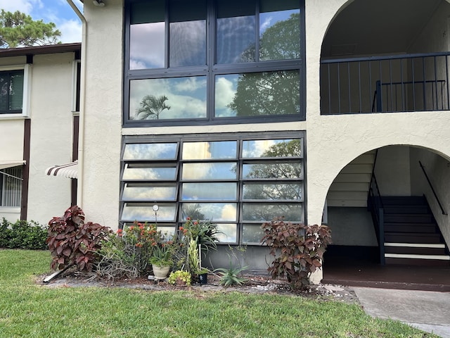 3623 La Playas Ct Unit A-1, Greenacres, FL 33463 - view of side of property featuring stucco siding