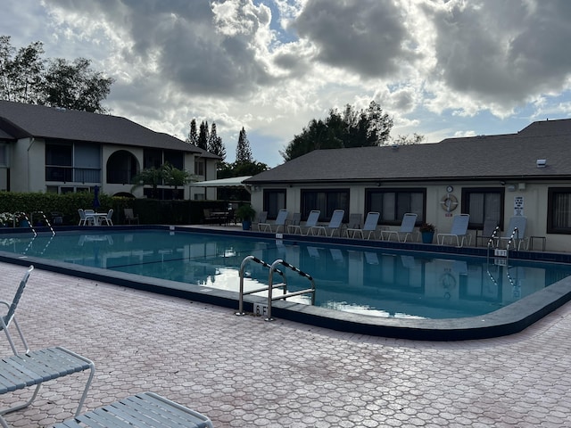 3623 La Playas Ct Unit A-1, Greenacres, FL 33463 - community pool featuring a patio