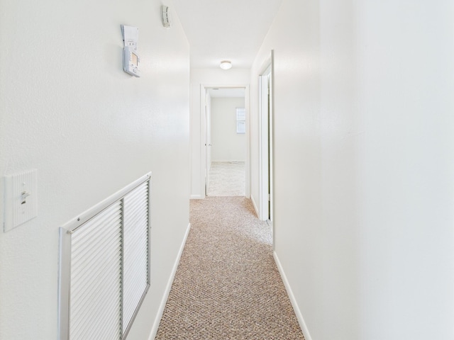 810 SE 13th St, Okeechobee, FL 34974 - hallway with light carpet and baseboards