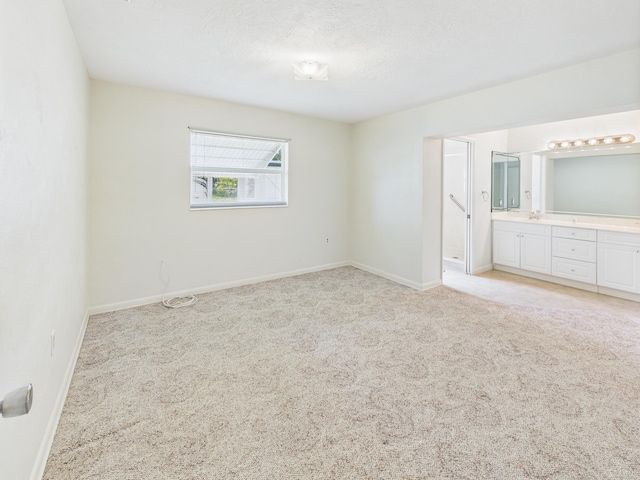 810 SE 13th St, Okeechobee, FL 34974 - empty room with light colored carpet and baseboards