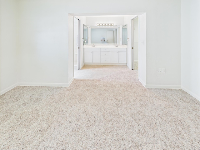 810 SE 13th St, Okeechobee, FL 34974 - empty room featuring light colored carpet and baseboards