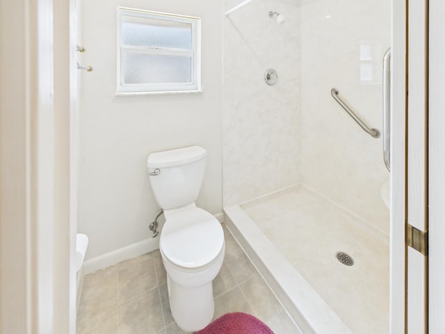 810 SE 13th St, Okeechobee, FL 34974 - bathroom featuring a walk in shower and tile patterned flooring