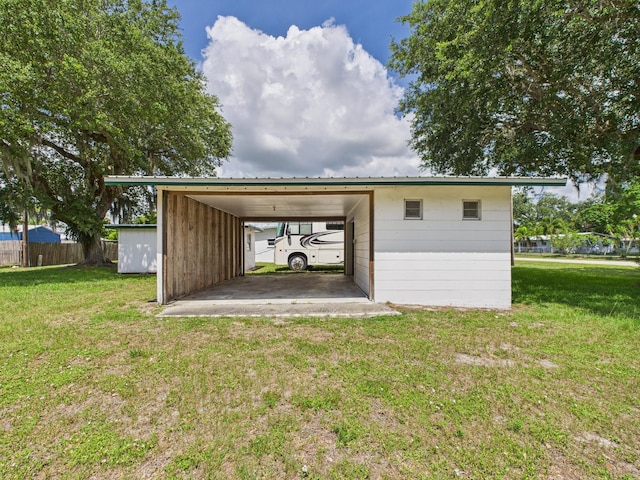 810 SE 13th St, Okeechobee, FL 34974 - garage with an attached carport