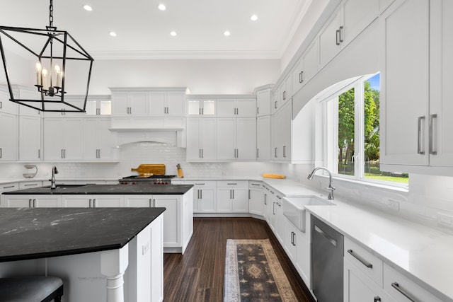 1257 Breakers W Blvd, West Palm Beach, FL 33411 - kitchen featuring dishwasher, ornamental molding, recessed lighting, white cabinetry, and decorative backsplash