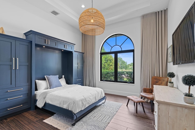 1257 Breakers W Blvd, West Palm Beach, FL 33411 - bedroom with a tray ceiling, dark wood-type flooring, and recessed lighting