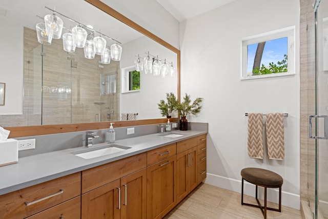 1257 Breakers W Blvd, West Palm Beach, FL 33411 - bathroom featuring double vanity and a shower stall