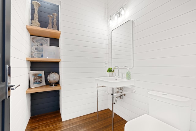 1257 Breakers W Blvd, West Palm Beach, FL 33411 - bathroom featuring wood finished floors and toilet