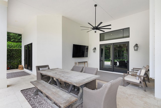 1257 Breakers W Blvd, West Palm Beach, FL 33411 - view of patio featuring outdoor dining area and a ceiling fan