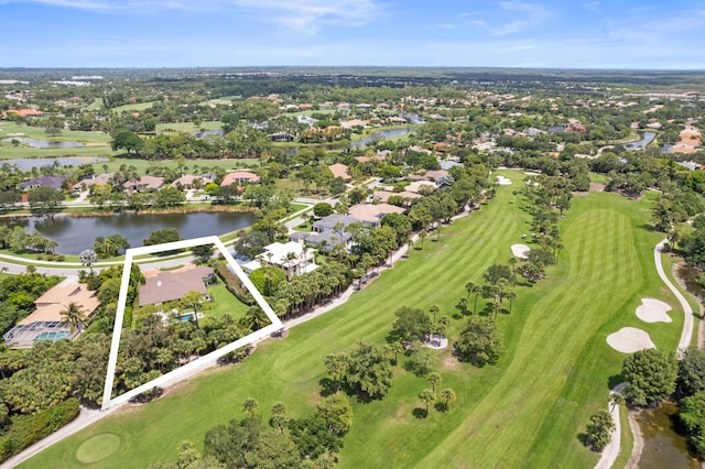 1257 Breakers W Blvd, West Palm Beach, FL 33411 - aerial perspective of suburban area with property boundaries highlighted, a large body of water, and a local golf course