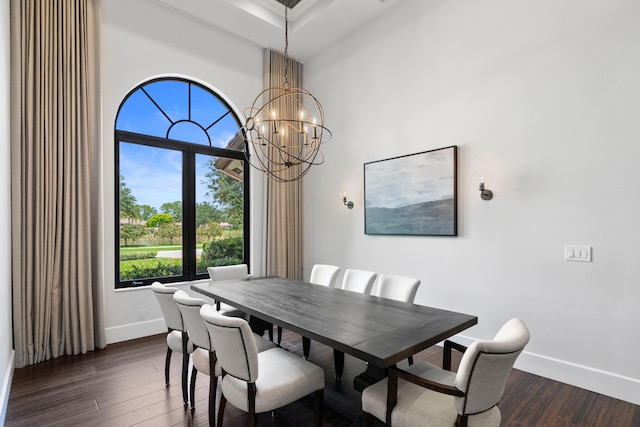 1257 Breakers W Blvd, West Palm Beach, FL 33411 - dining area featuring dark wood finished floors, a chandelier, and a high ceiling