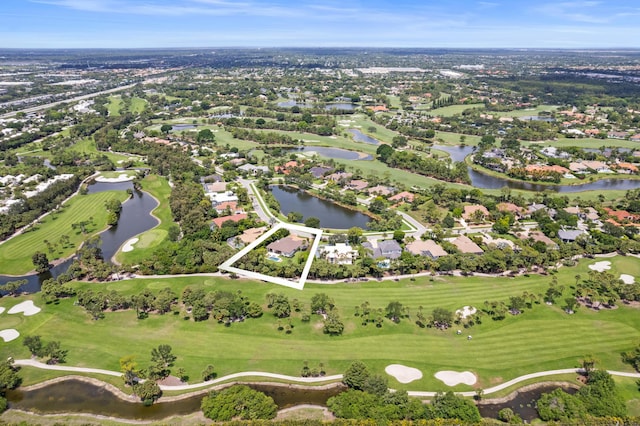 1257 Breakers W Blvd, West Palm Beach, FL 33411 - aerial view of property's location featuring a nearby body of water, nearby suburban area, and property parcel outlined