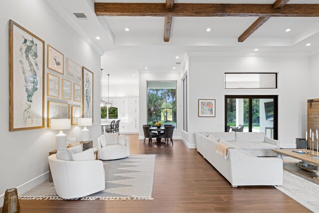1257 Breakers W Blvd, West Palm Beach, FL 33411 - living area featuring coffered ceiling, healthy amount of natural light, recessed lighting, and wood finished floors