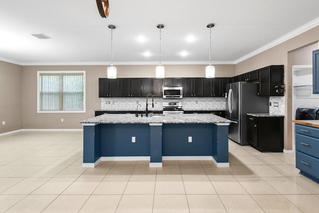 1842 SW Lofgren Ave, Port Saint Lucie, FL 34953 - kitchen featuring appliances with stainless steel finishes, tasteful backsplash, light tile patterned floors, and ornamental molding