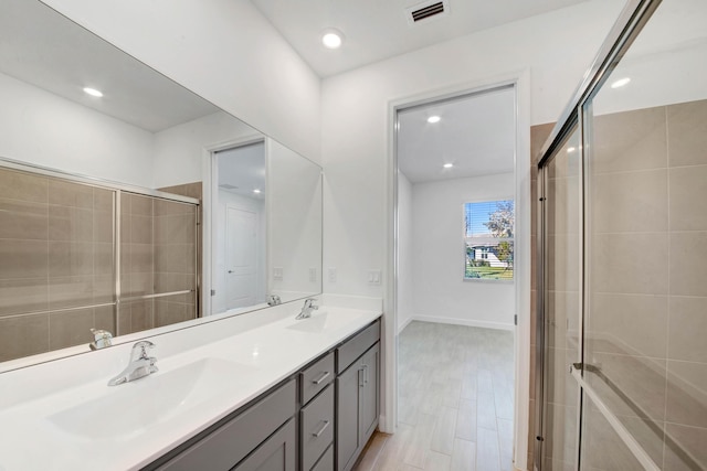 14511 Three Ponds Trl, Delray Beach, FL 33446 - full bathroom featuring double vanity, a shower stall, and recessed lighting