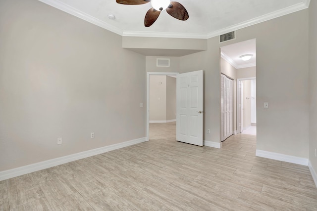 40 SE Sedona Cir Unit 104, Stuart, FL 34994 - empty room with ornamental molding, a ceiling fan, and light wood-type flooring