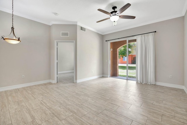 40 SE Sedona Cir Unit 104, Stuart, FL 34994 - spare room featuring ceiling fan, ornamental molding, and a smoke detector