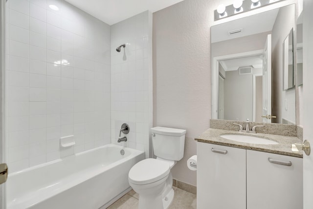 40 SE Sedona Cir Unit 104, Stuart, FL 34994 - full bathroom featuring vanity, bathtub / shower combination, tile patterned floors, and a textured wall