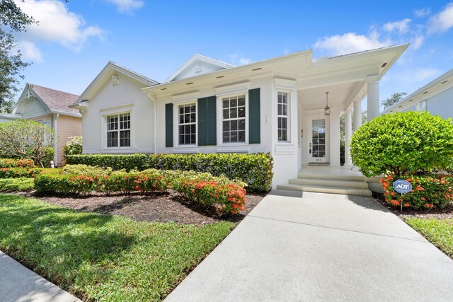 40 SE Sedona Cir Unit 104, Stuart, FL 34994 - view of front facade with stucco siding