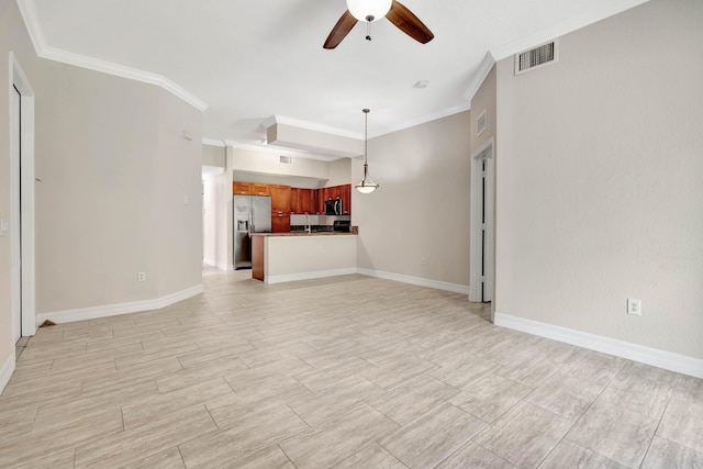 40 SE Sedona Cir Unit 104, Stuart, FL 34994 - unfurnished living room with a ceiling fan and crown molding