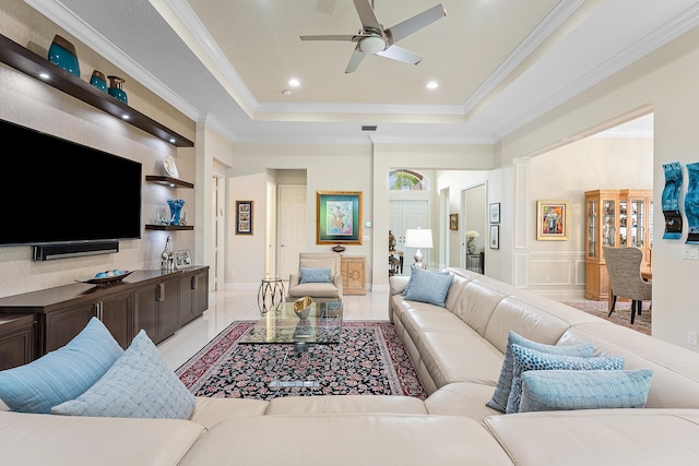 8271 Green Mountain Rd, Boynton Beach, FL 33473 - living room featuring a ceiling fan, a tray ceiling, crown molding, and recessed lighting