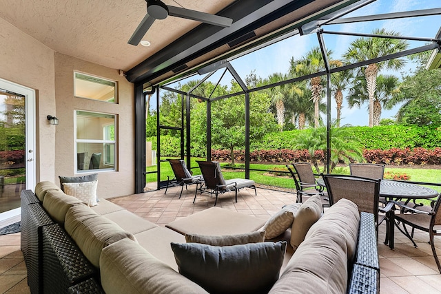 8271 Green Mountain Rd, Boynton Beach, FL 33473 - view of patio / terrace with outdoor lounge area, outdoor dining space, ceiling fan, and glass enclosure