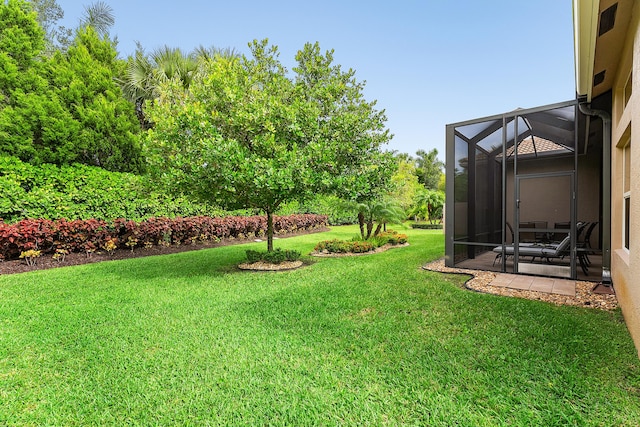 8271 Green Mountain Rd, Boynton Beach, FL 33473 - view of grassy yard featuring a patio area and a lanai
