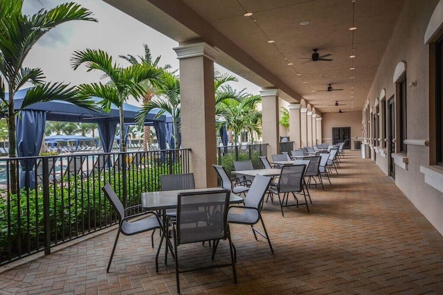 8271 Green Mountain Rd, Boynton Beach, FL 33473 - view of patio / terrace with outdoor dining space and a ceiling fan