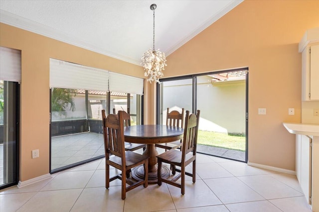 2646 Mohawk Cir, West Palm Beach, FL 33409 - dining area with lofted ceiling, ornamental molding, a chandelier, and light tile patterned floors