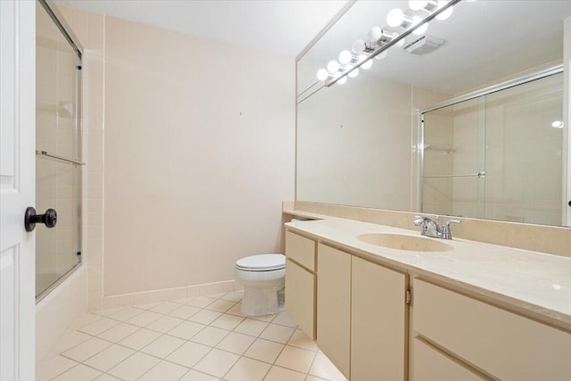 2646 Mohawk Cir, West Palm Beach, FL 33409 - full bath with tile patterned floors, vanity, and enclosed tub / shower combo