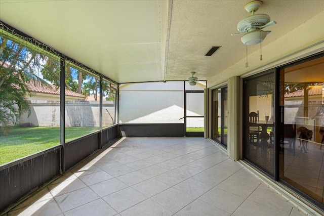 2646 Mohawk Cir, West Palm Beach, FL 33409 - unfurnished sunroom with a ceiling fan and healthy amount of natural light