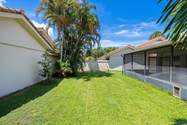 2646 Mohawk Cir, West Palm Beach, FL 33409 - view of yard with a sunroom