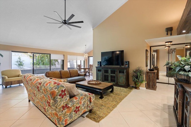2646 Mohawk Cir, West Palm Beach, FL 33409 - living room with high vaulted ceiling, light tile patterned flooring, and ceiling fan