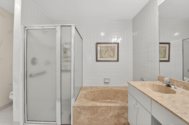 7824 Lexington Club Blvd Unit A, Delray Beach, FL 33446 - bathroom with vanity, a shower stall, and a garden tub