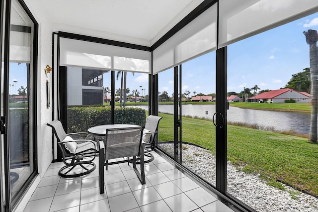 7824 Lexington Club Blvd Unit A, Delray Beach, FL 33446 - sunroom with a water view, healthy amount of natural light, and outdoor dining space